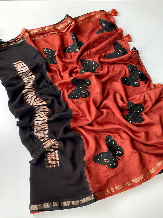 Cotton saree with applique work paired with mirror embroidered blouse