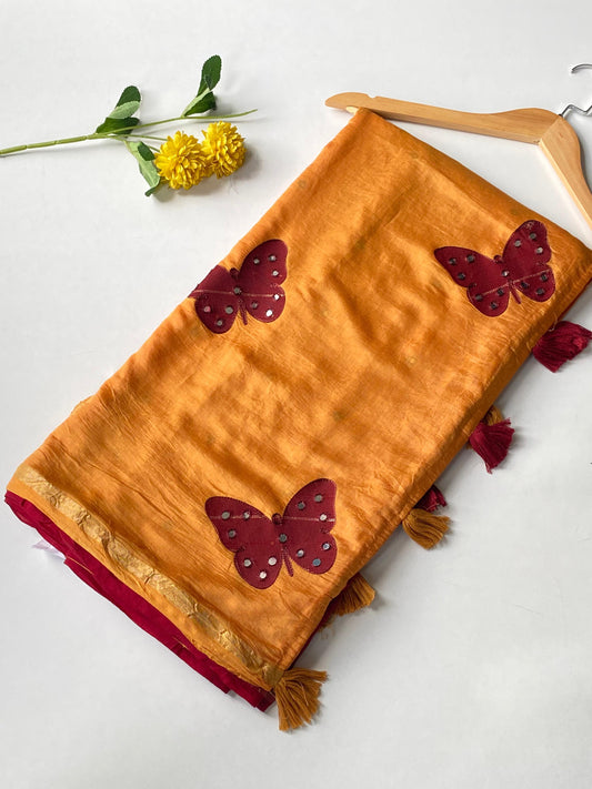 Cotton saree with applique work paired with mirror work blouse