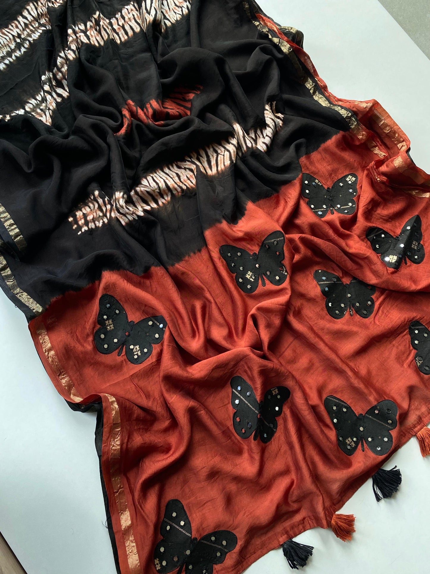 Cotton saree with applique work paired with mirror embroidered blouse