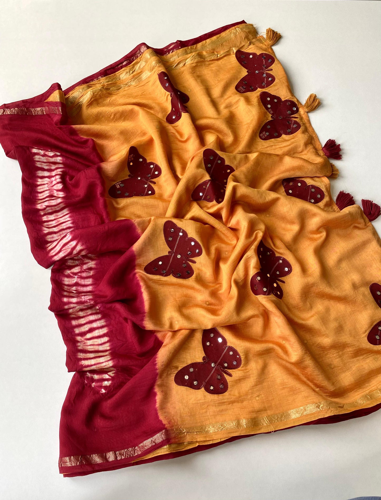 Cotton saree with applique work paired with mirror work blouse